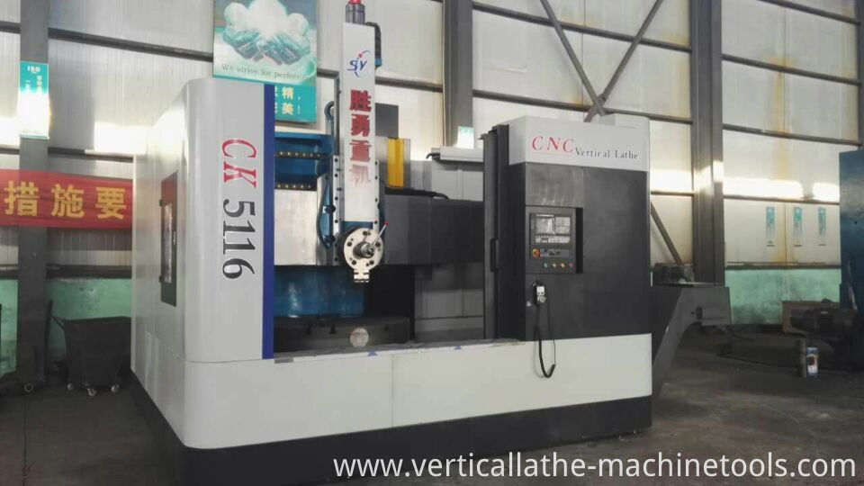 Single frame vertical lathe